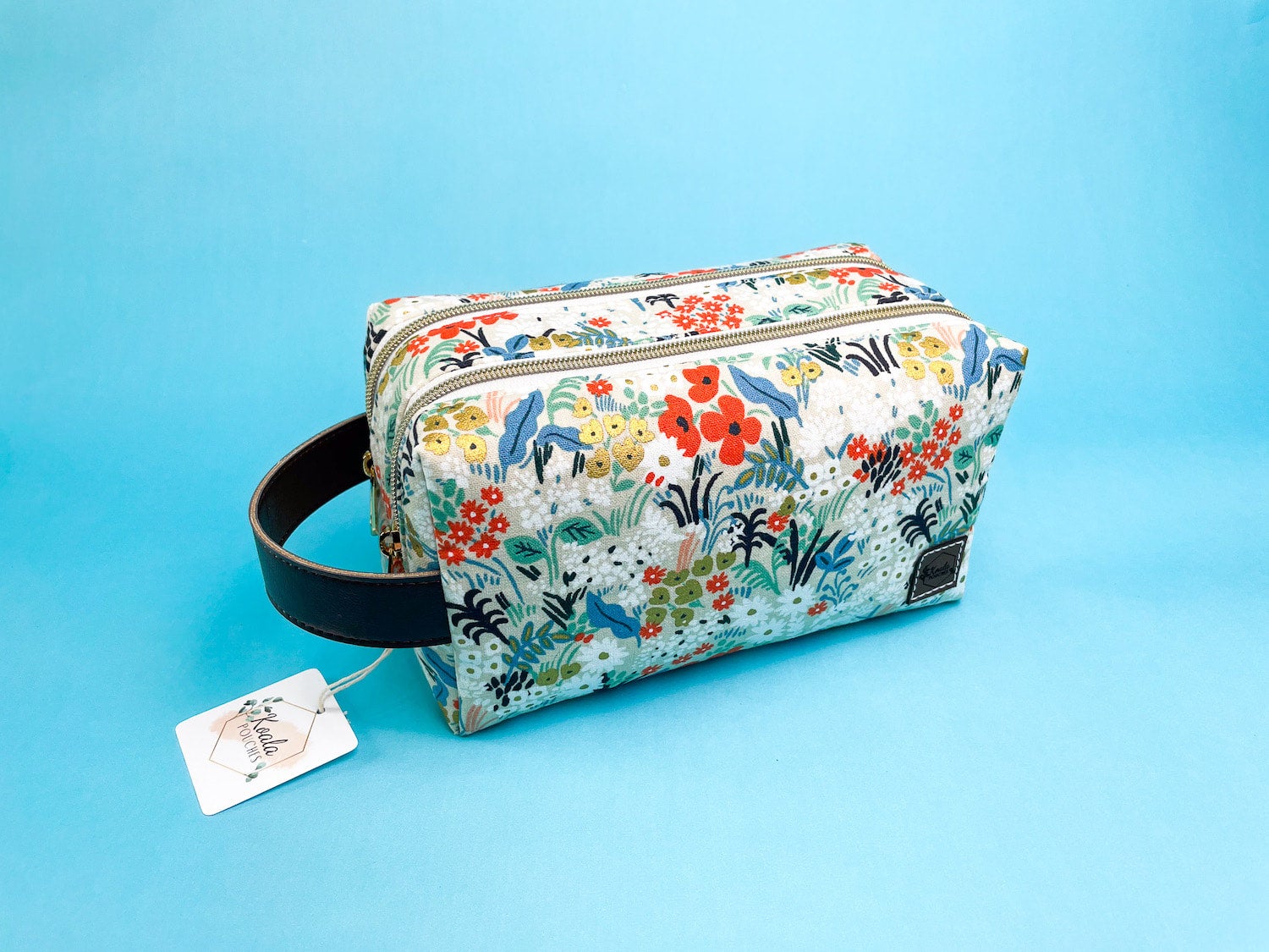 The Desi Cosmetic Bag | Black Poppy Fields Fabric | Black Bonded Leather