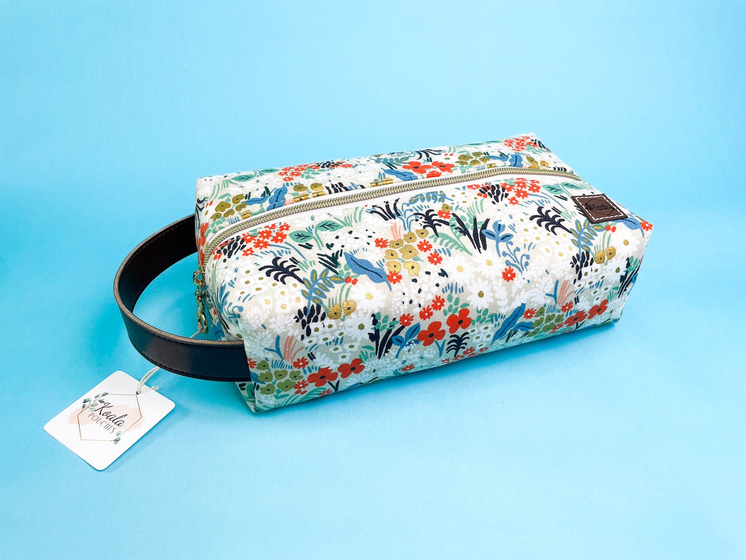 The Desi Cosmetic Bag | Black Poppy Fields Fabric | Black Bonded Leather